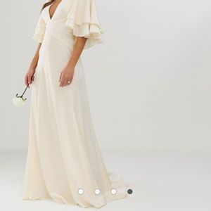 Satin paneled wedding dress with flutter sleeve